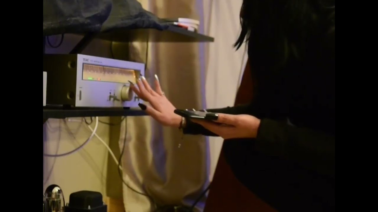 Radio tuning. A young girl is tuning a tuner...