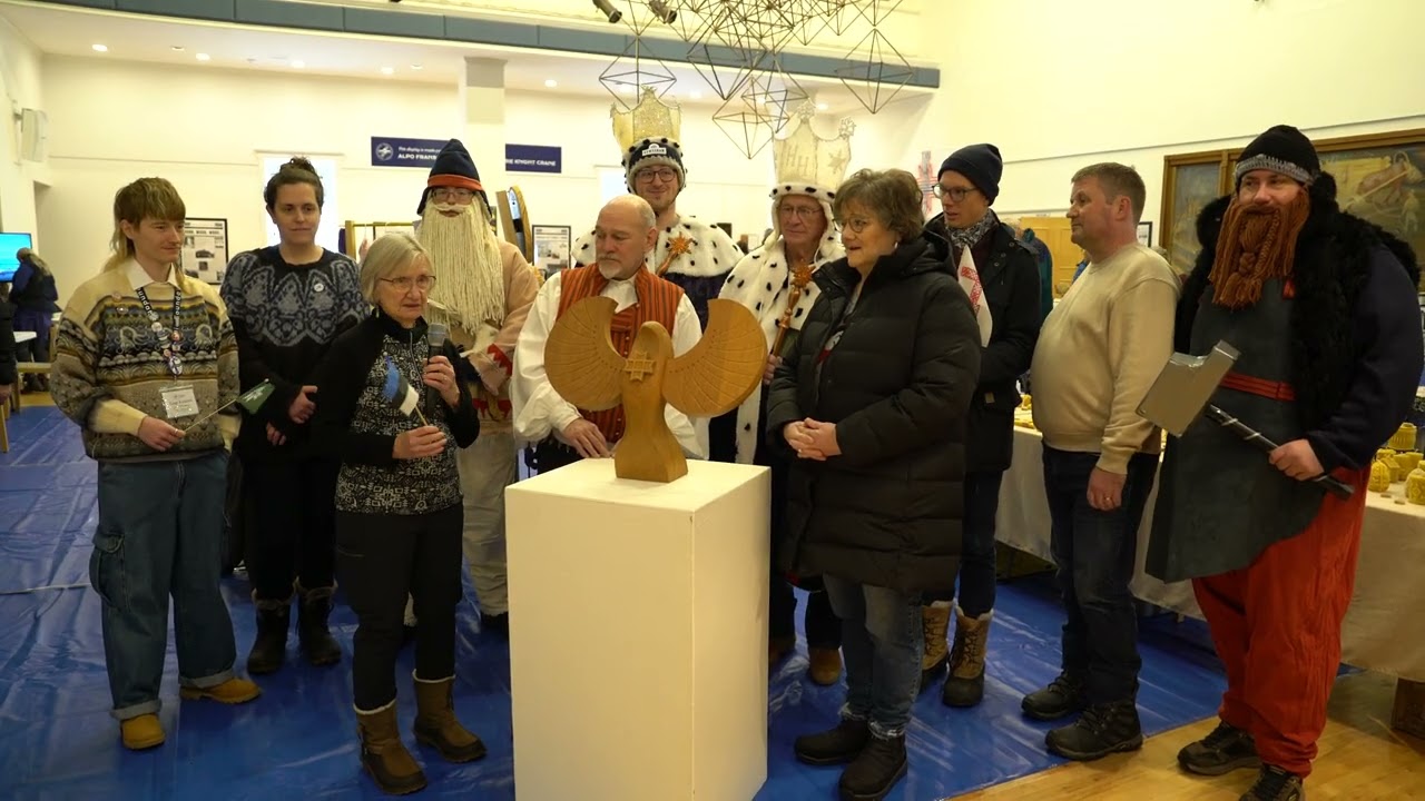 Handover of Tsirk bird - symbol of the Finno-Ugric Capital of Culture programme - to Hancock