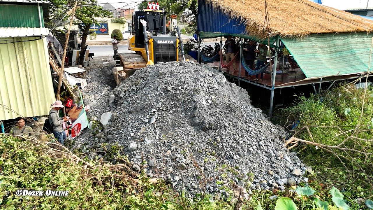 Nicely Activities New project Use SHANTUI Dozer & Many Dump Truck Unloading Stone Back Fill Big Pond