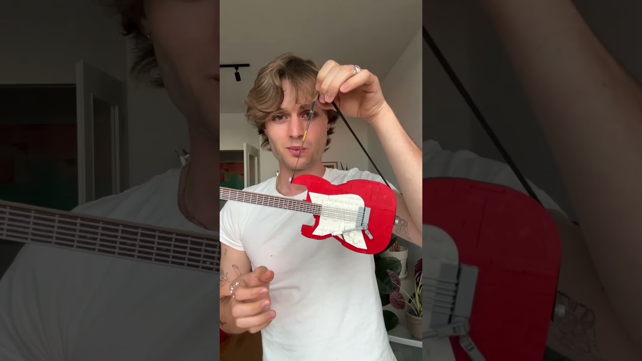 my inner child is crying rn. This is the best thing ever!! #guitar #lego #interiordesign