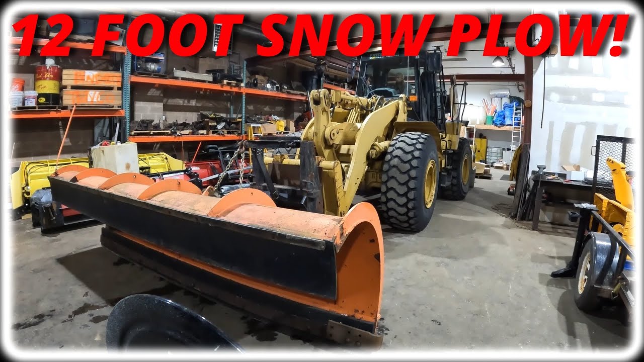 Installing A 12' Monroe Snow Plow On Our CAT 950G Wheel Loader!