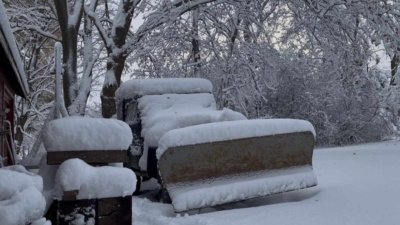 Plowing snow with an old flat fender jeep