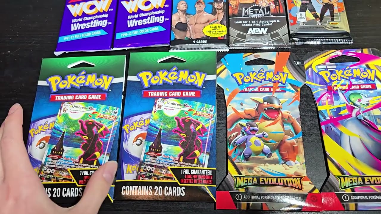 Открываю загадочные бустеры Pokémon с Мега-Э, а также наборы WWE и WCW.