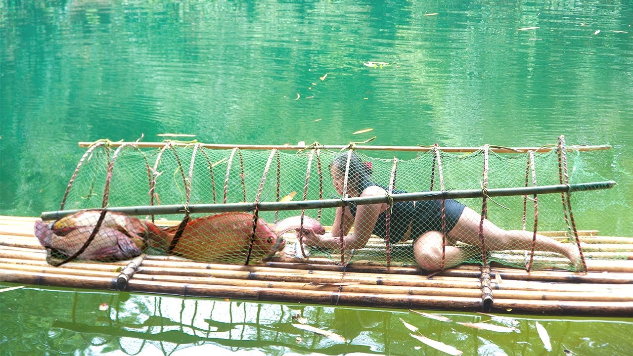 Peaceful river, big fish and the girl's skillful fishing skills on the river
