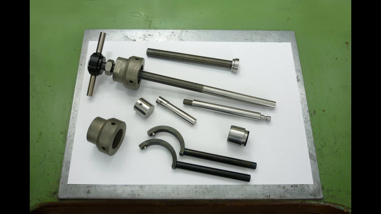 Making a spindle adjustable stop and an extended lock nut for the mini lathe