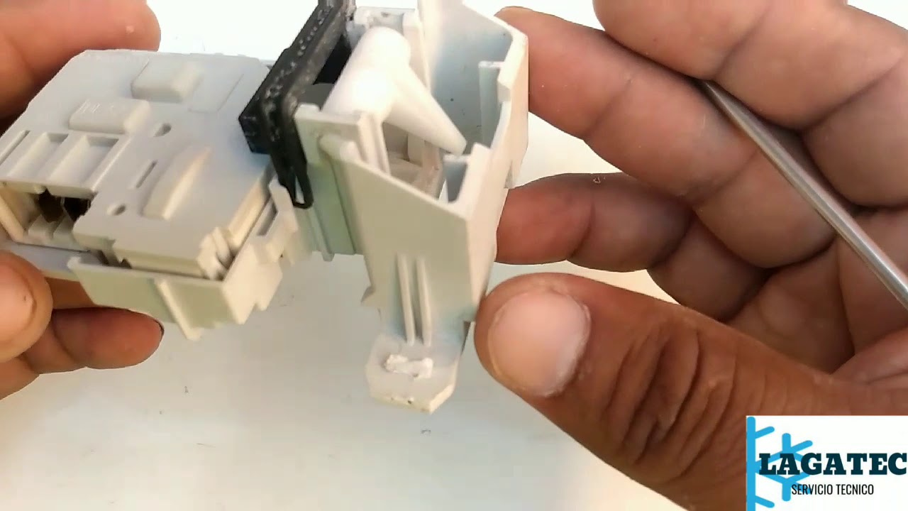 Cómo retirar lid lock de lavadora Xpert sytem jaguar