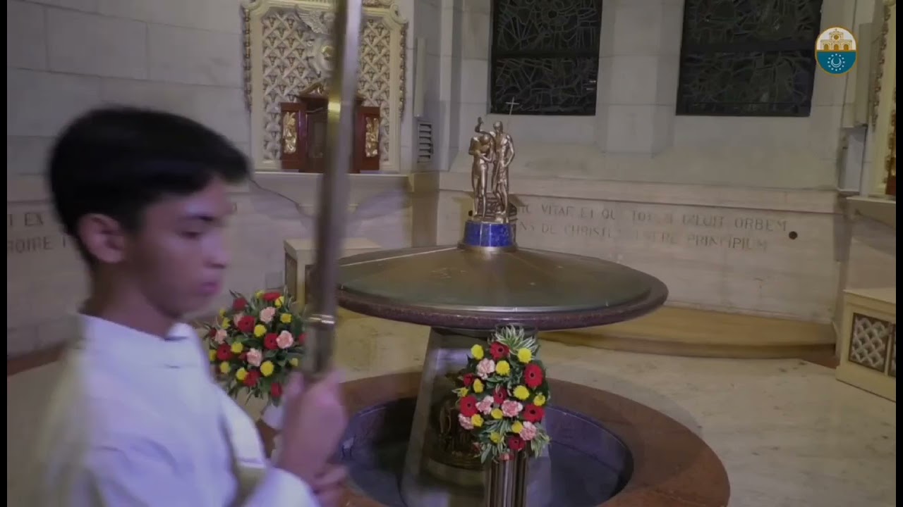 The Transfer of Paschal Candle from Sanctuary to the Baptistry during Pentecost Sunday