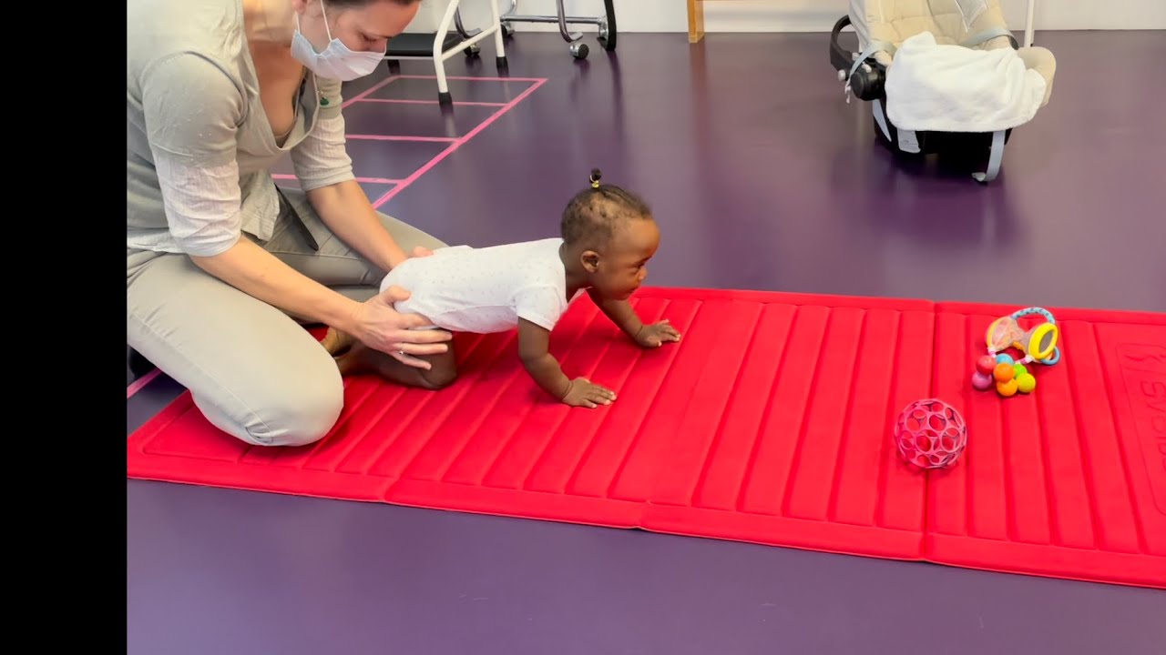 Séance kiné d’un bébé porteur de trisomie 21 et évolution psychomotrice