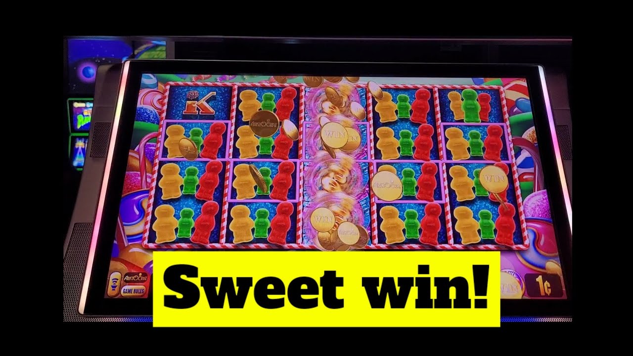 Hitting a sweet win on this candy theme slot machine!