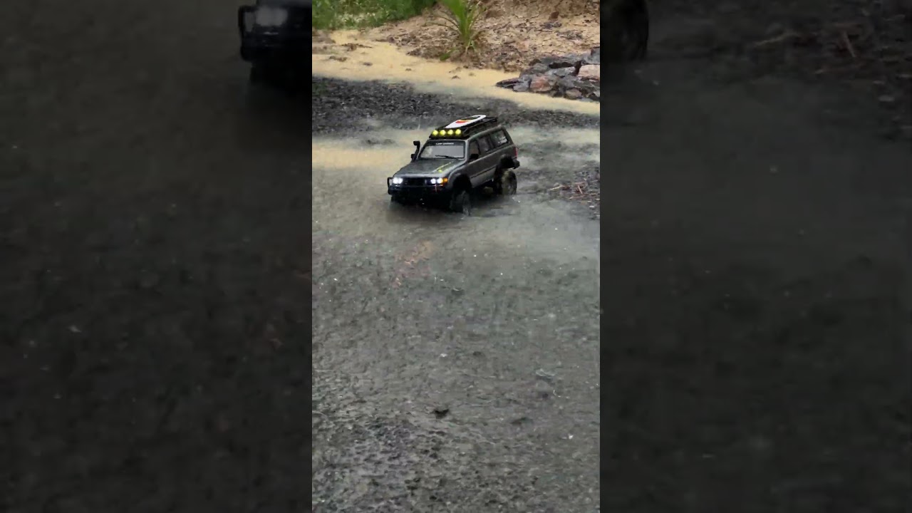 Driving an RC LC80 in heavy rain#shorts #shortvideo #rc #rccar #automobile #offroad #amercia #india