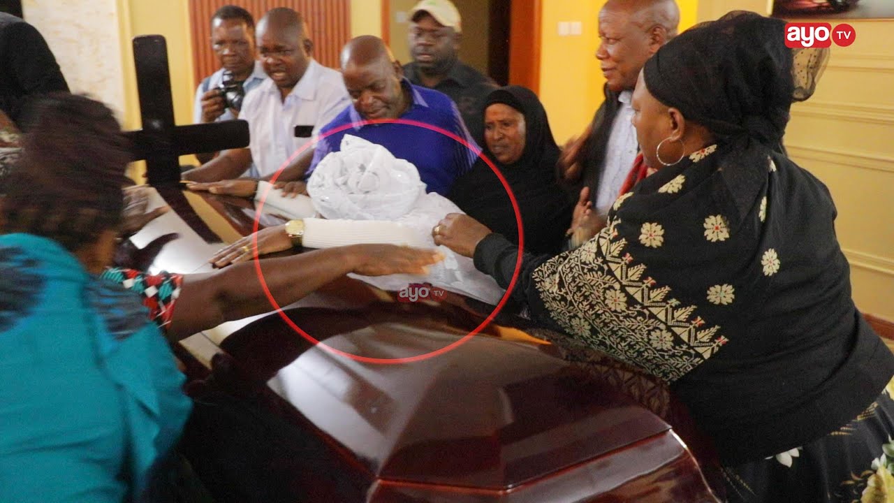 VILIO NA SIMANZI MWILI WA NDUGAI UKIWASILI NYUMBANI KWAKE, MKE WAKE AKUMBATIA JENEZA