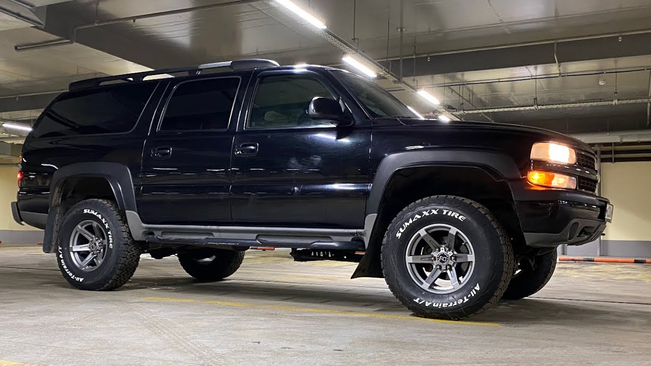 Sumaxx All-Terrain tires and fake Black Rhino rims on Chevrolet Suburban Z71