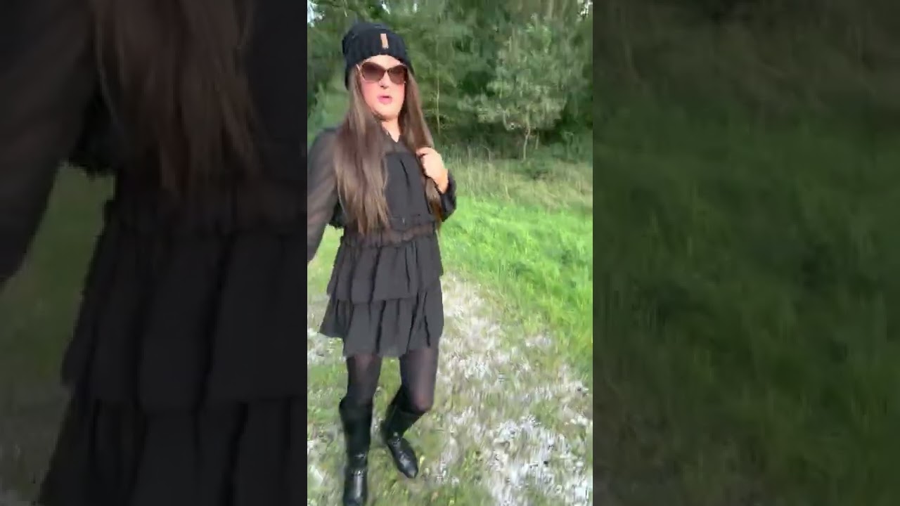 Female Latex Mask walking outside