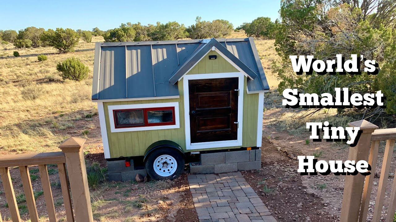 WORLD'S SMALLEST TINY HOUSE | Build Part 5: Foundation, Outhouse, Deck & Kitchen