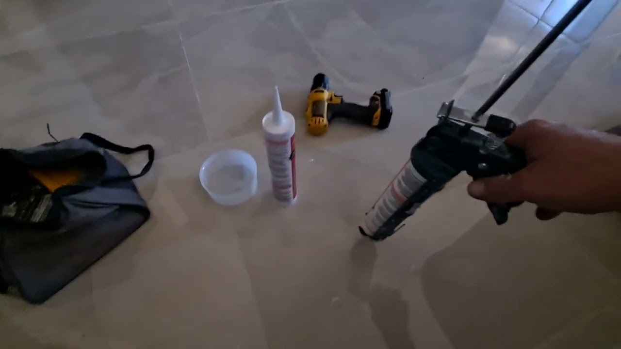 Using Fix-a-floor to fix a loose hollow floor tile in 10 minutes for good.