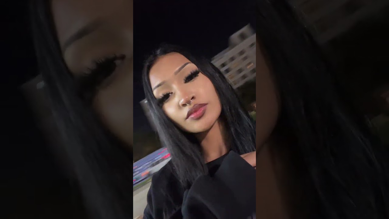 Nighttime makeup look with a septum piercing