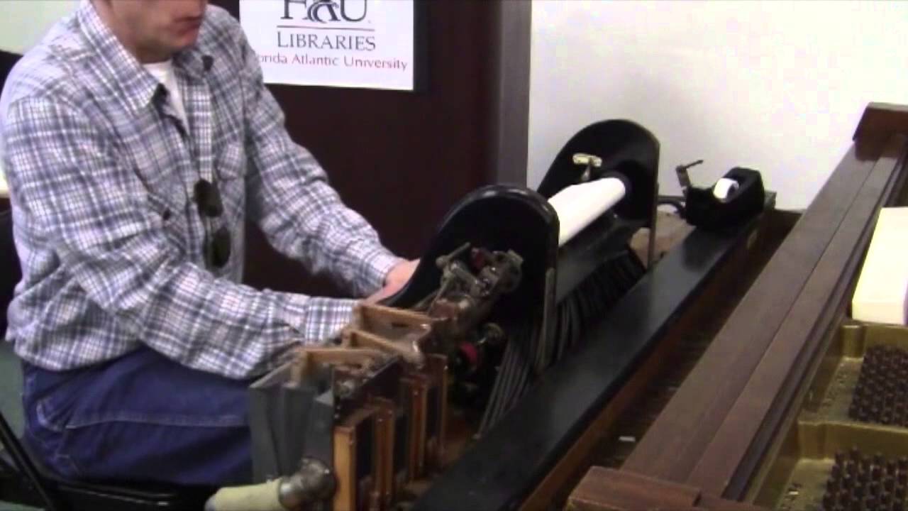 Bob Berkman sets up the pianola.