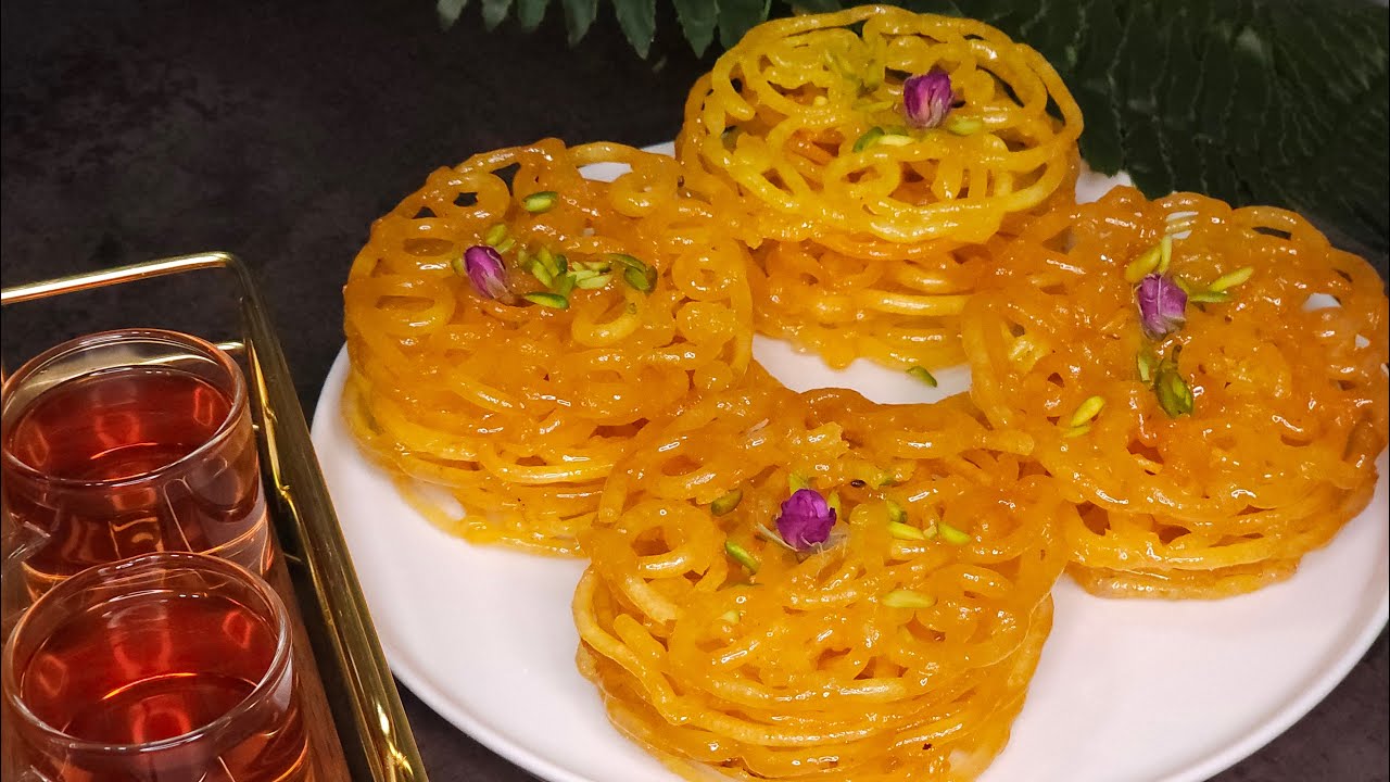 آموزش زولبیا ترد و شیشه ای به سبک بازاری بدون جوش شیرین و خمیر مایه همراه با آموزش شربت بار