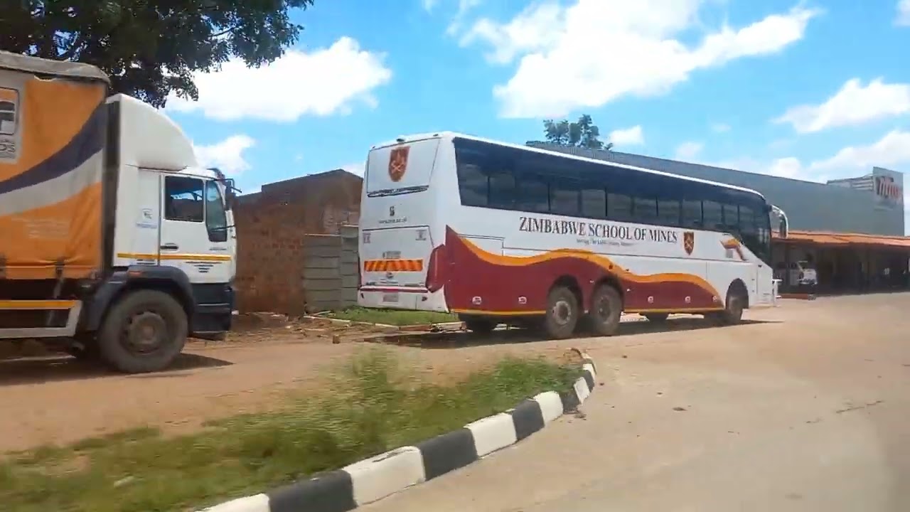Drive along Plumtree Road into Bulawayo CBD. Raw unfilterd.Industrial side.