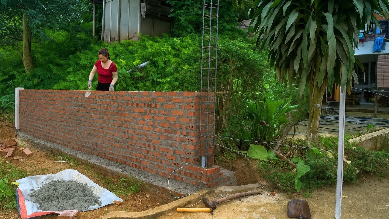 Building a Solid Fence for Neighbors – Constructing a Sturdy Brick Wall and Iron Columns