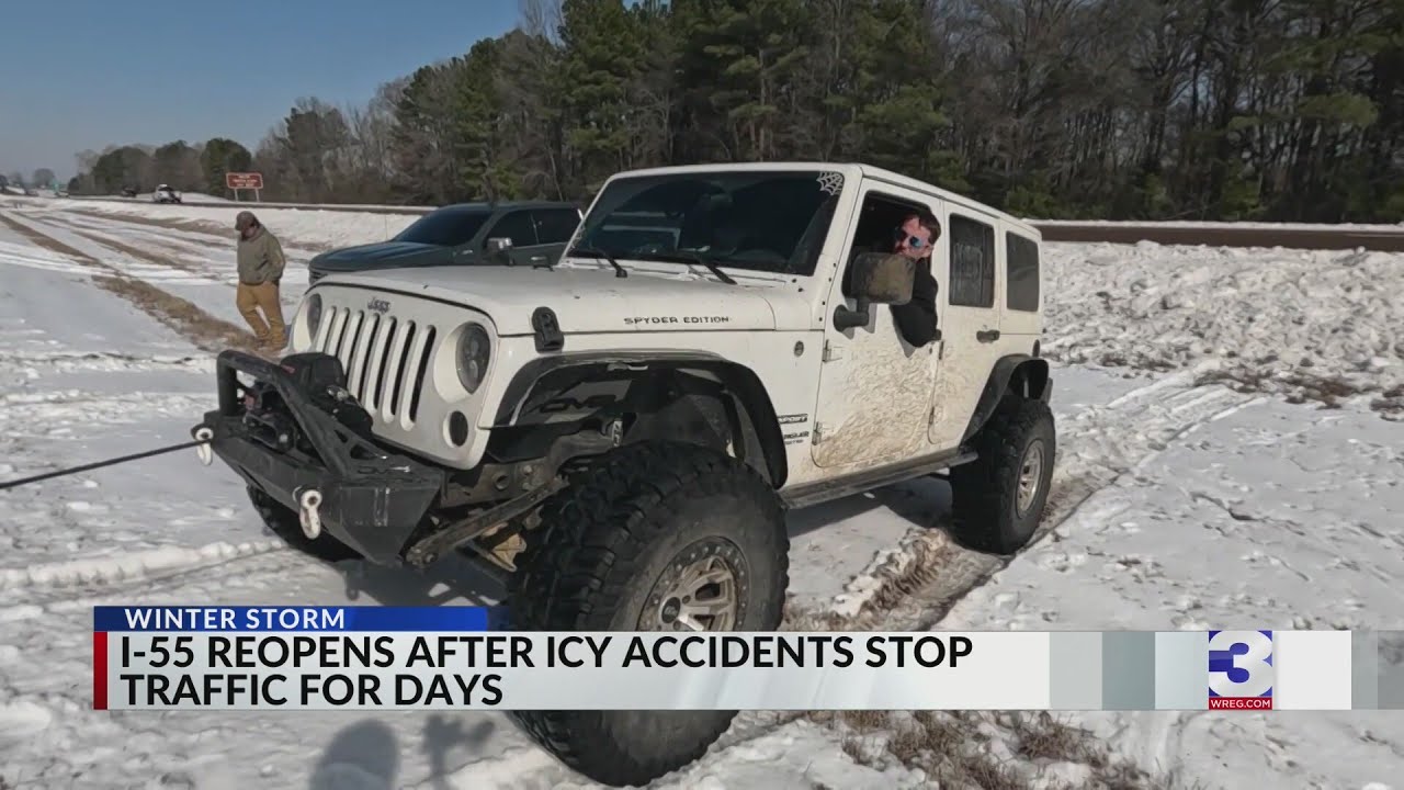 Father and son rescue truckers on icy I-55 using their Jeeps