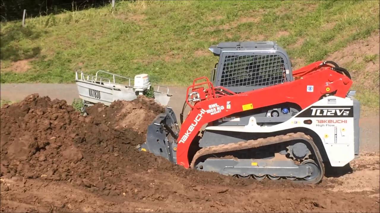 TAKEUCHI TL12 V2 Rubber Tracked Skidsteer Loader With Tilting 4 in1 bucket