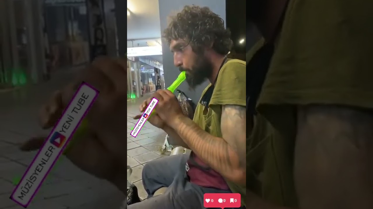 Sokakta Flüt çalan adam.. Müzik heryerde..