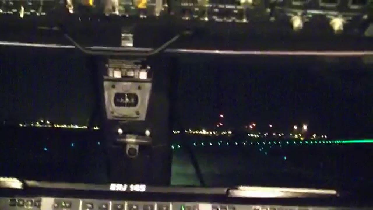 Night landing at Schiphol Amsterdam. Cockpit view.