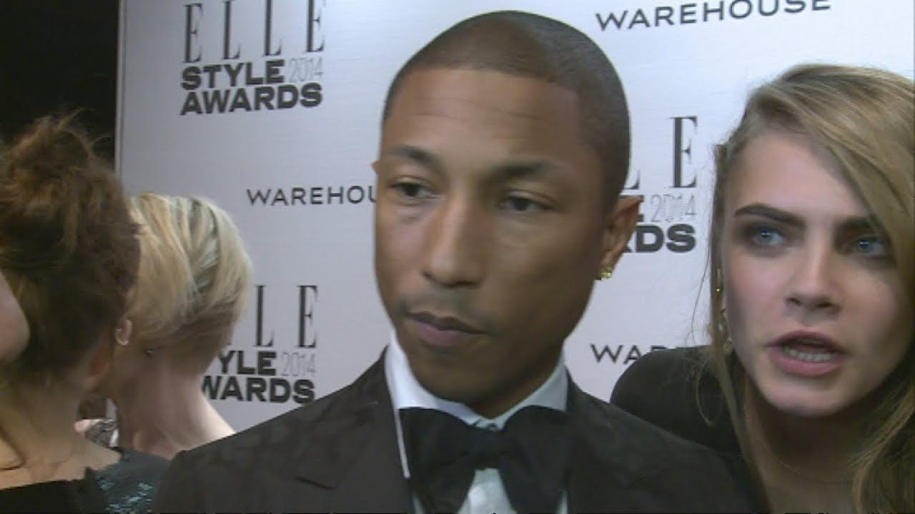 Cara Delevingne video bomb! Cara barges into Pharrell's interview at Elle Style Awards