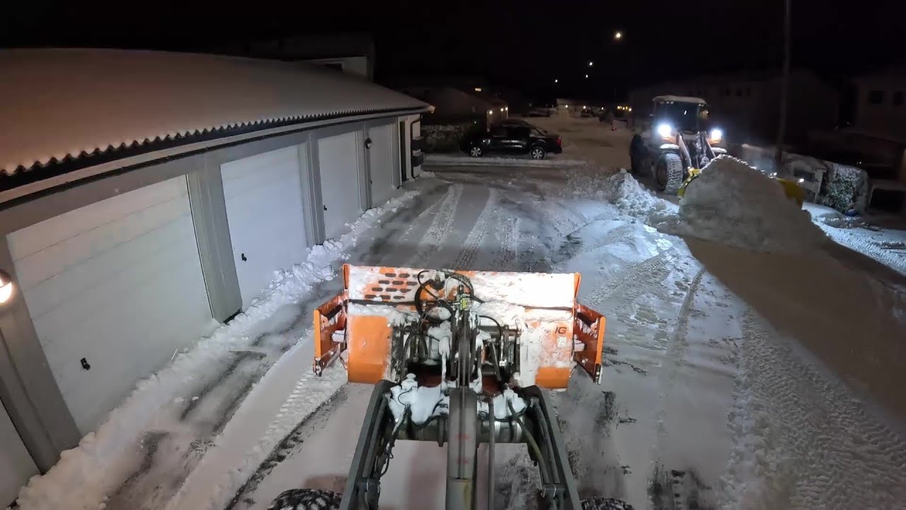 Plowing a HUGE apartment area in the middle of a snowstorm