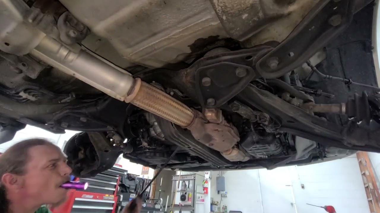 Front CV Axles, Full Assembly Struts & Outer Tie Rods on a 1998 Nissan Maxima