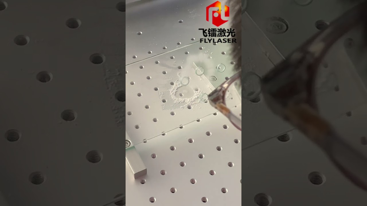 The 100-watt laser glass drilling machine is under test before shipment...