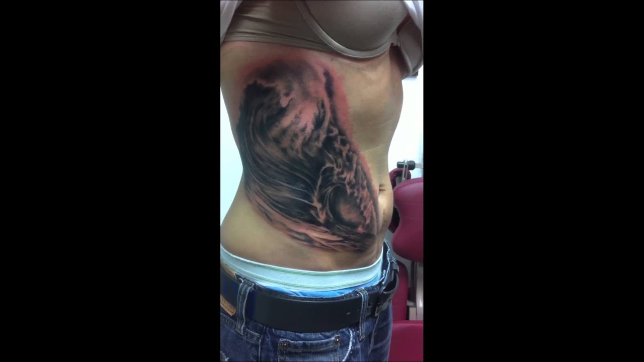 Ocean wave tattoo