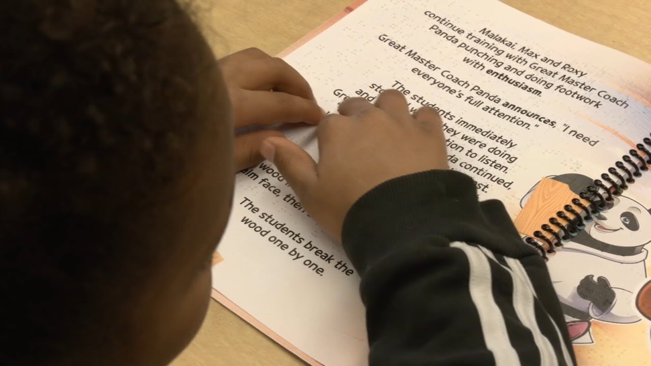 Students at Kentucky School for the Blind read book in braille written by 8-year-old blinded by