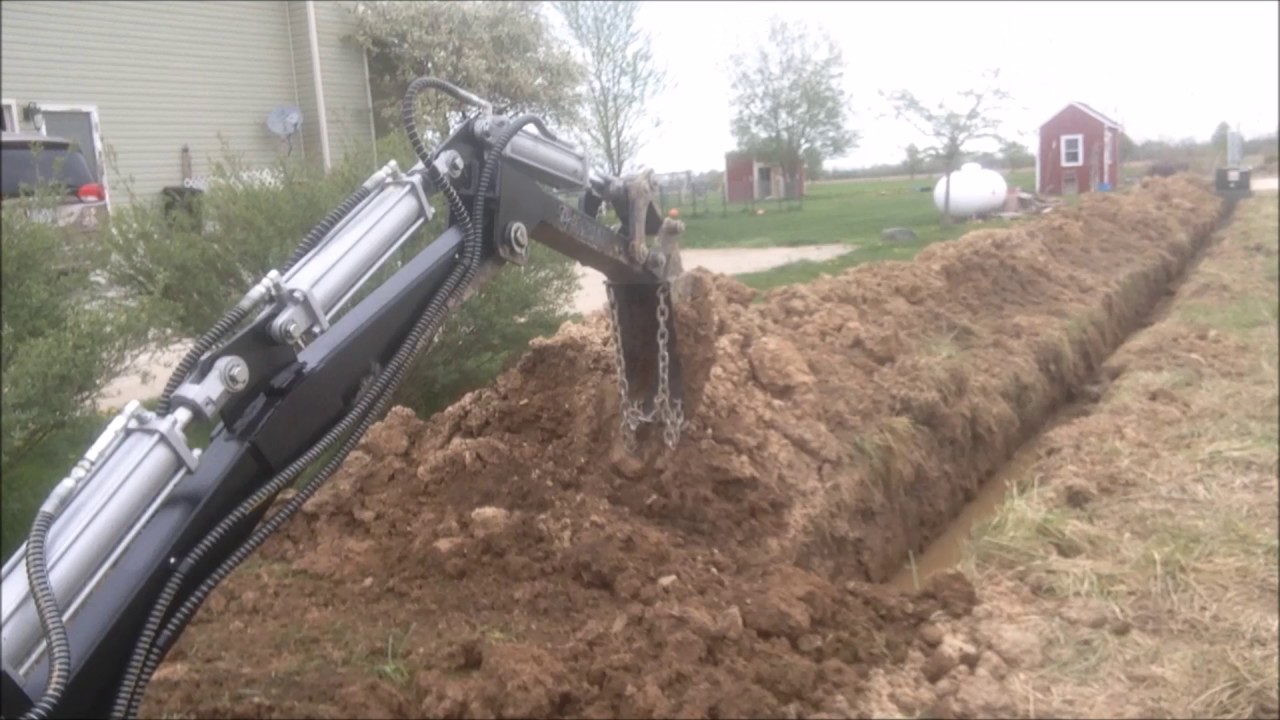 Filling in trench with Jansen minibagger mb300