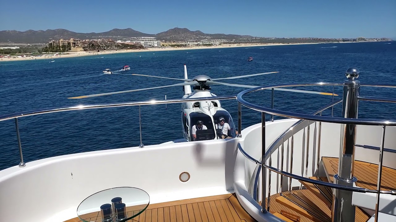 Helicopter take off on a Private Yacht.