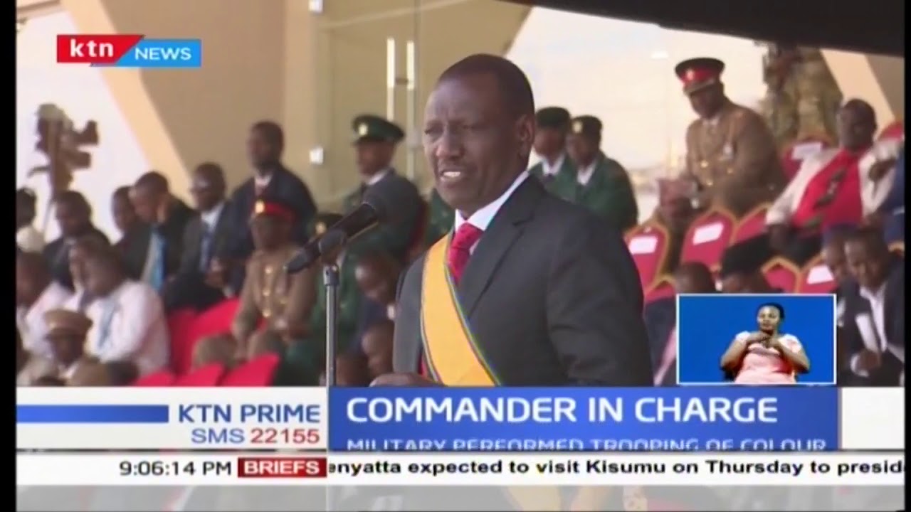 Commander in charge: President Uhuru wears full military uniform for the first time