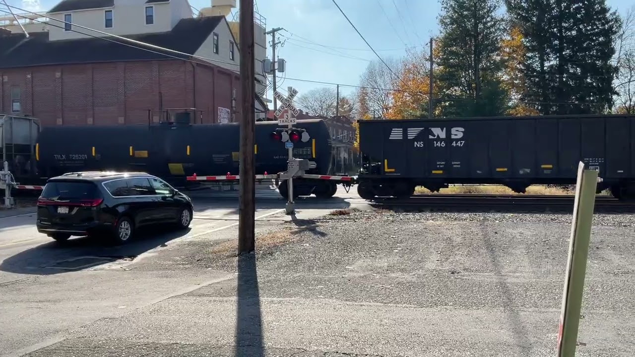 West bound ns unit 8049 ns unit 1165  mixed freight train in sinking spring 