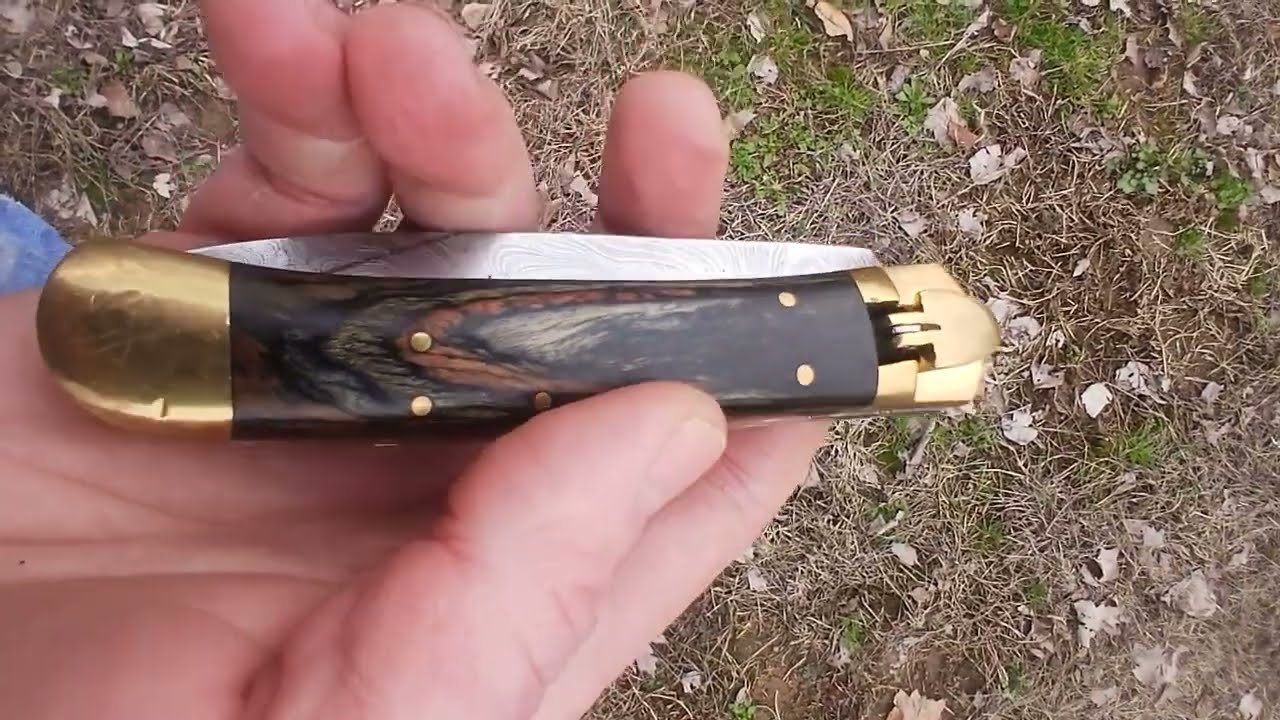 SWITCHBLADE KNIFE DAMASCUS VERY WELL MADE FILE WORKED BACKSTRAP LAMINATED HANDLES !!!