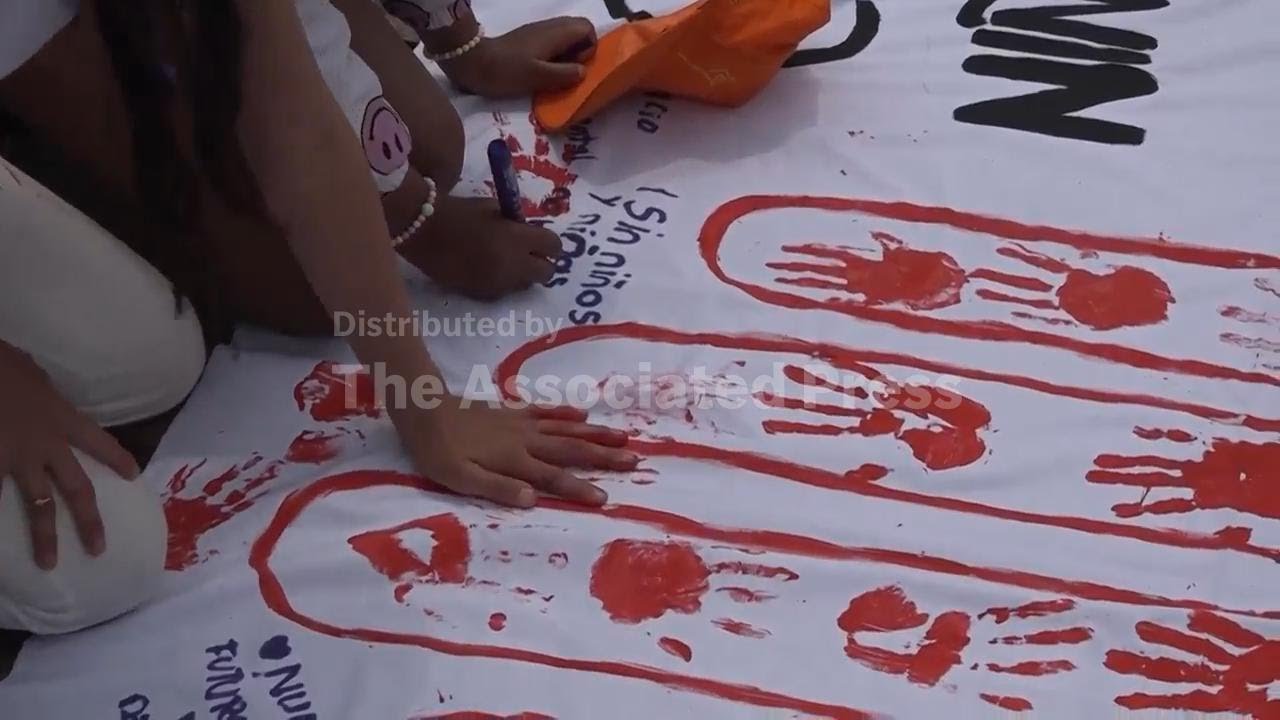 Red hands symbolise Colombia's child fighters as UNICEF reports alarming rise in recruitment