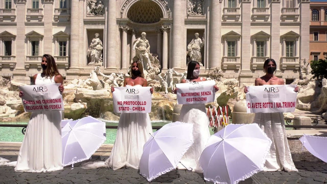 Italian women protest in wedding dresses