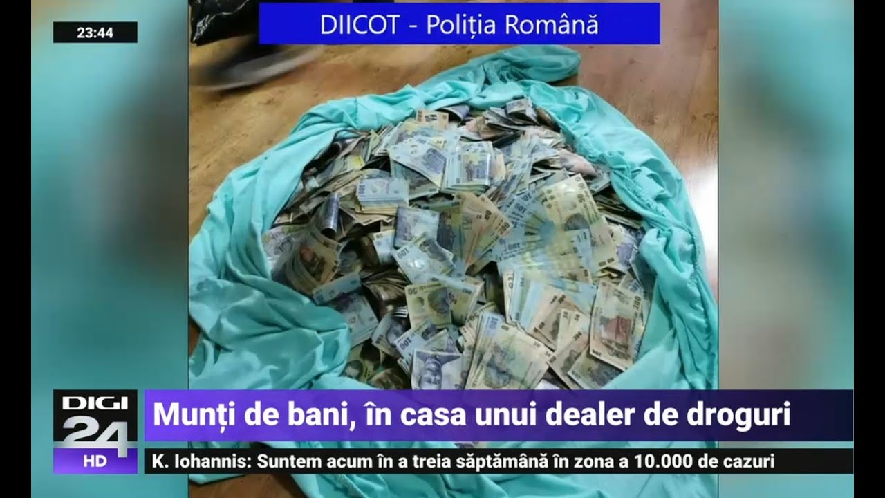 Imagini ca-n filme. Munți de bani, găsiți în casa unui traficant de droguri