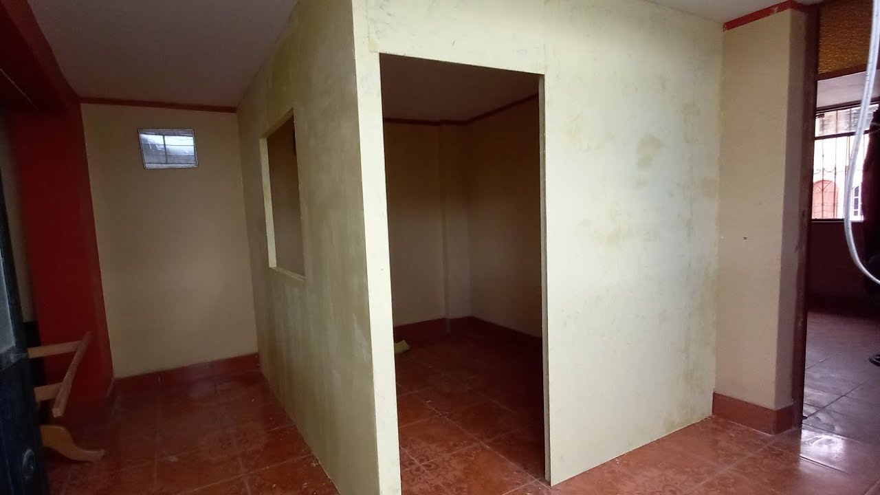 CUARTO DE OSB EN CASA DE CONCRETO