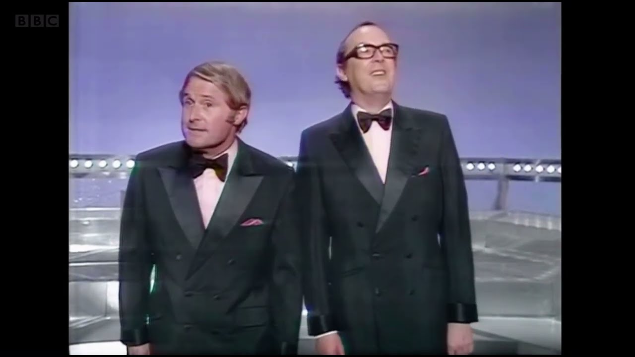 Morecambe and Wise perform the end of show song  'Bring Me Sunshine'