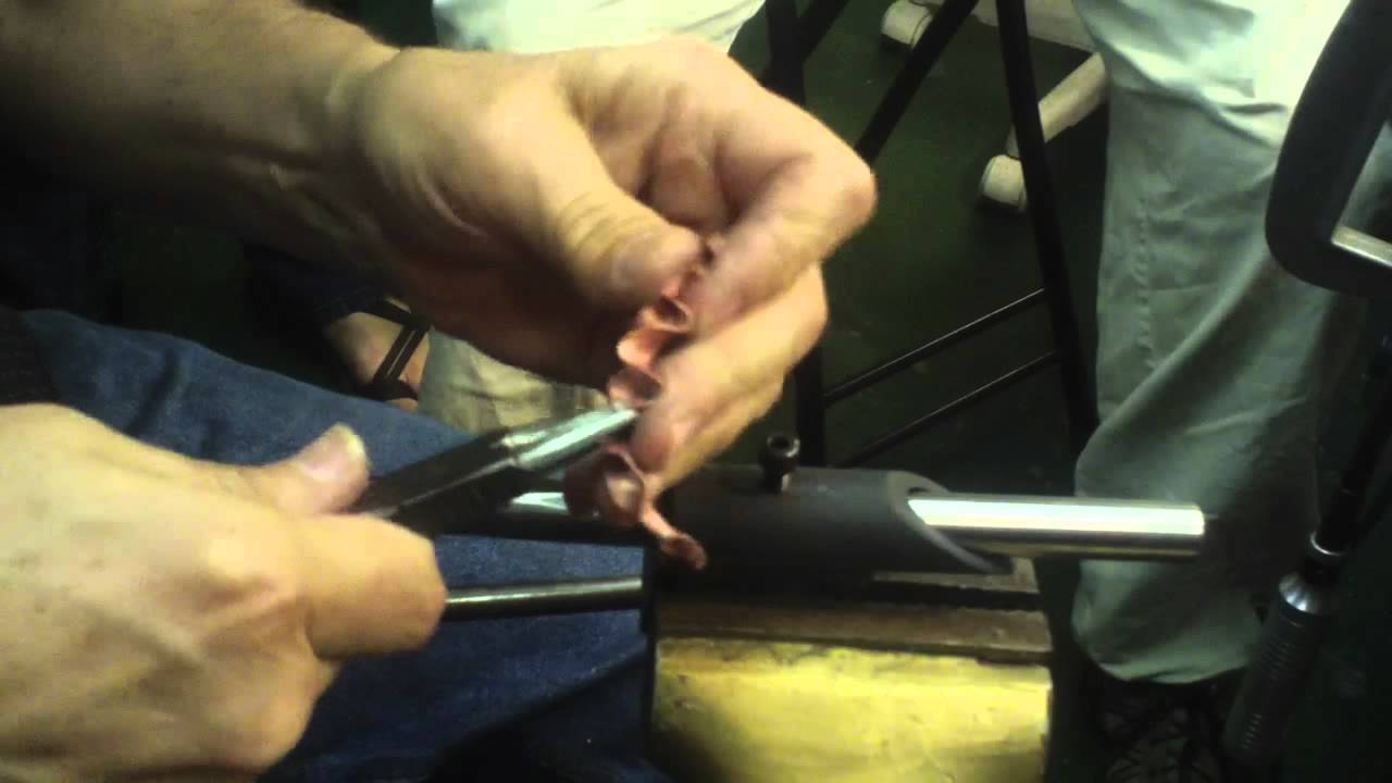 Shaping an anticlastic shape