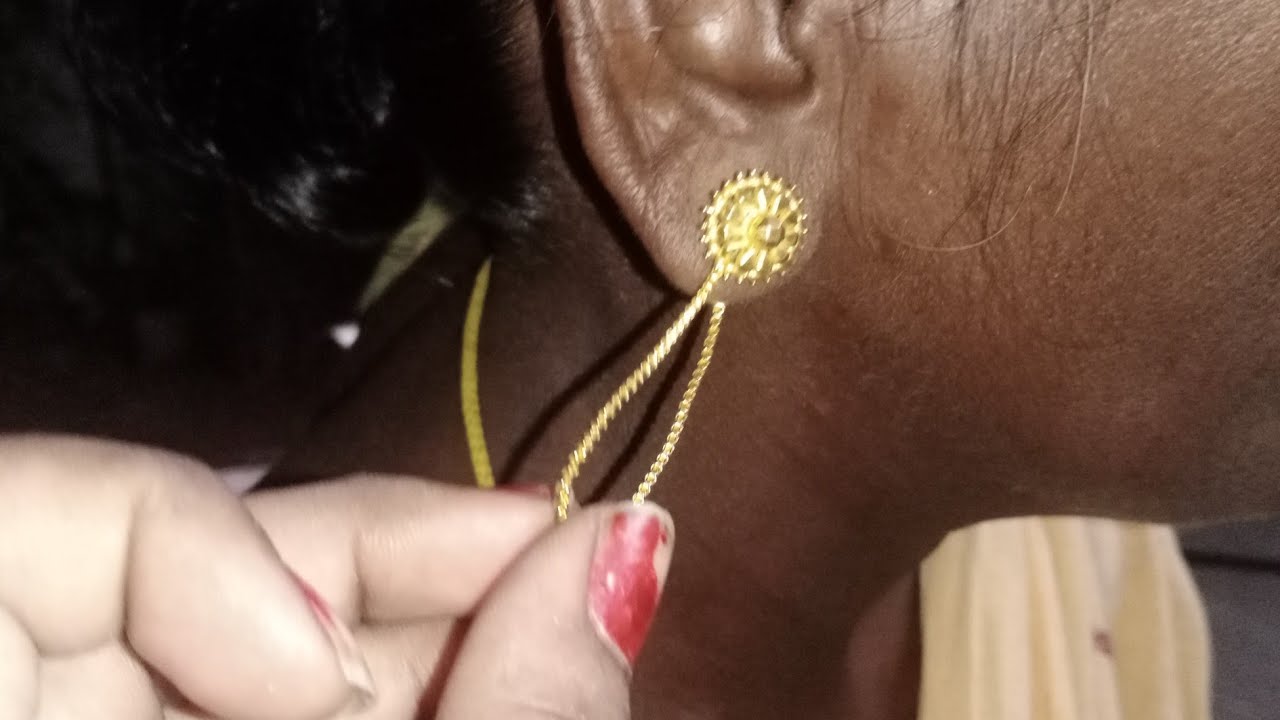 Ear pulling /gold earring pulling by grandma /in telugu