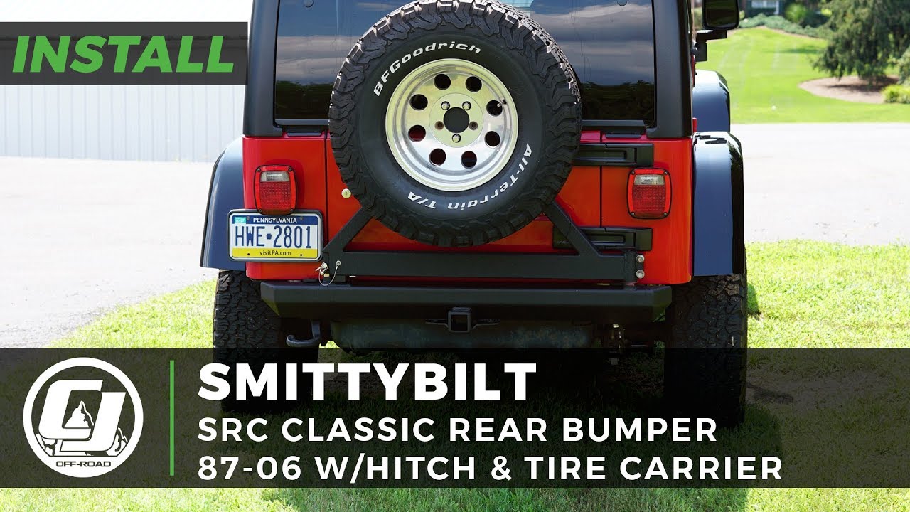Установка на Jeep Wrangler 1987–2006 гг.: задний бампер Smittybilt SRC Classic с фаркопом и держа...