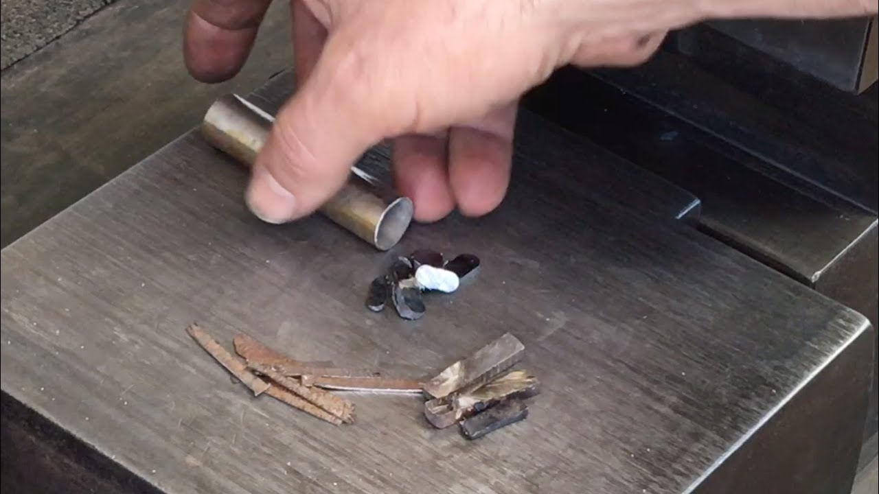 Fire Welding Bits of Tool Steel using Stainless Steel Pipe as Flux Barrier / Container