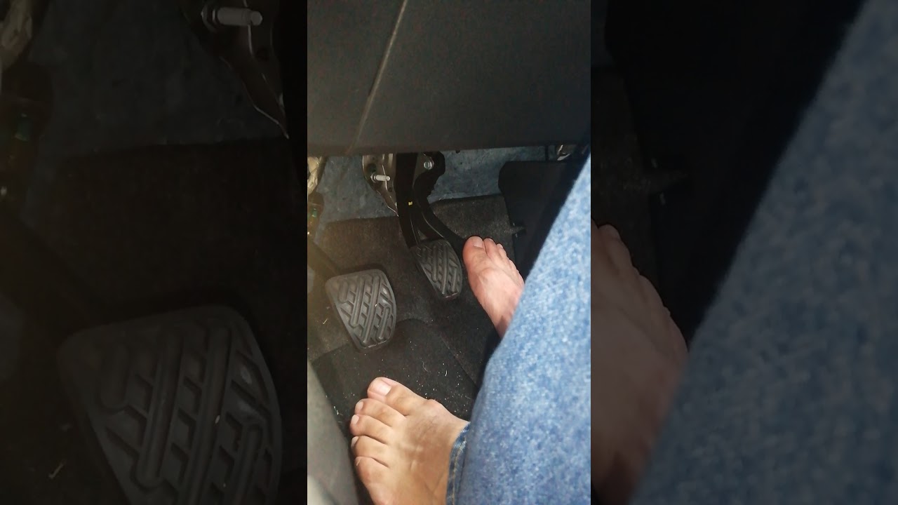 Driving Barefoot in jeans.