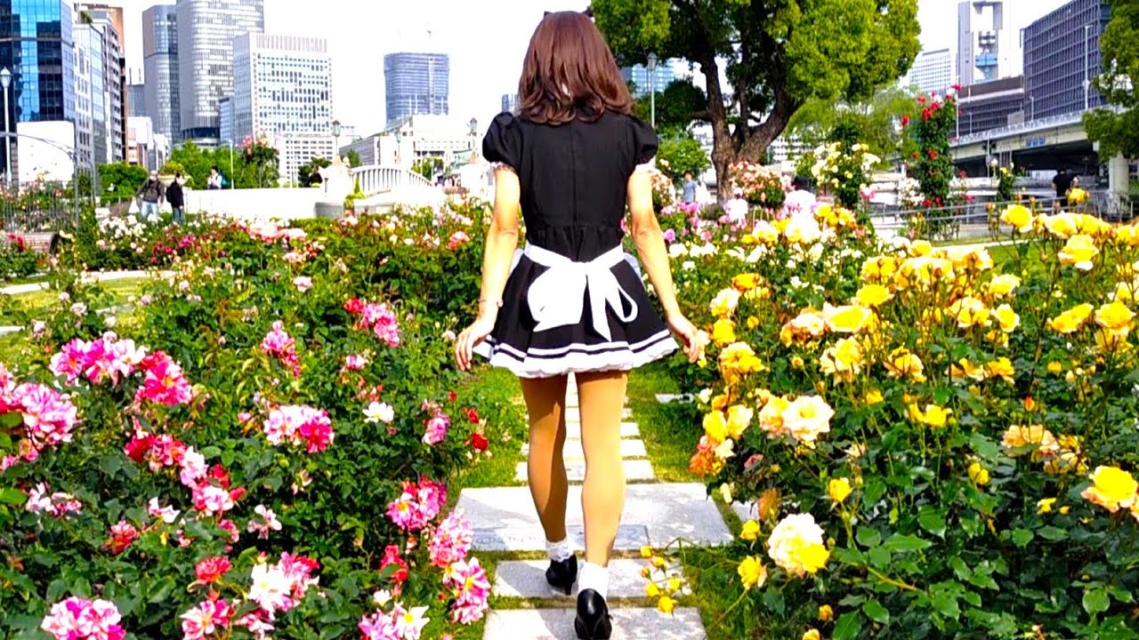 Crossdresser cosplay,  maid outfit and  beautiful flowers